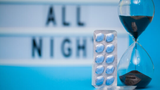 Viagra kept near an hourglass