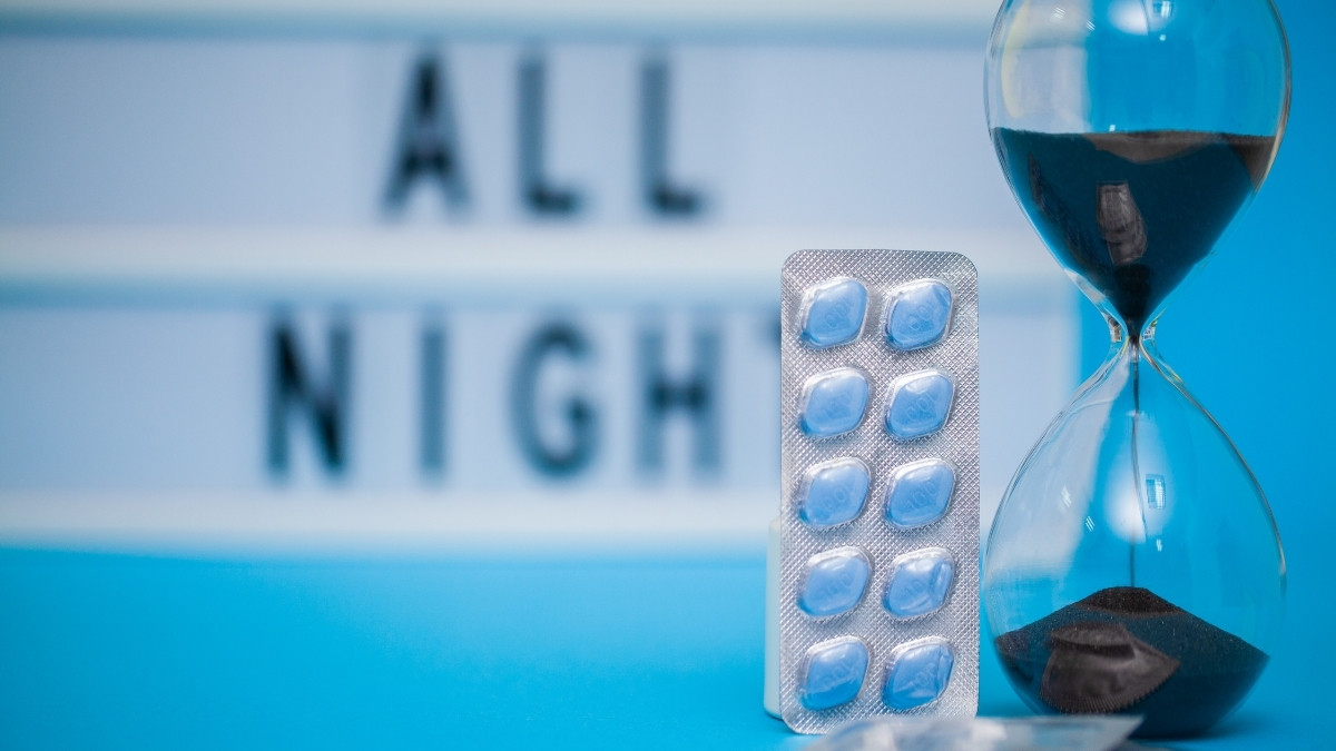 Viagra kept near an hourglass