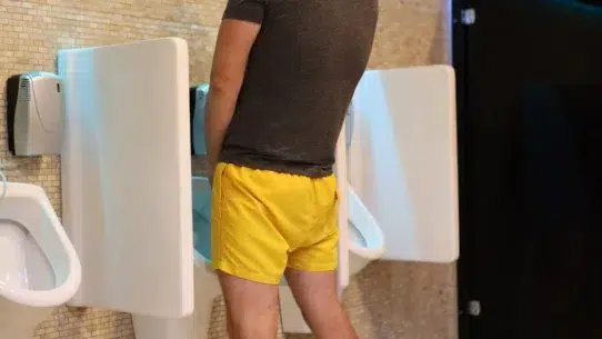A man peeing after sex trying to understand why does a man have to pee after ejaculating