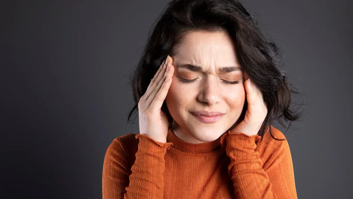 Woman suffering from headache