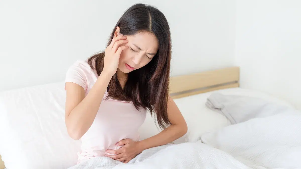period symptoms vs pregnancy symptoms