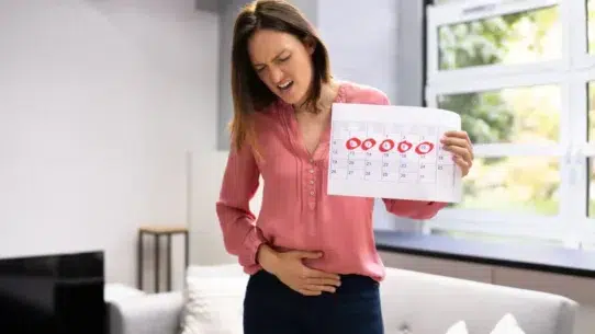 what causes a woman to menstruate twice in a month