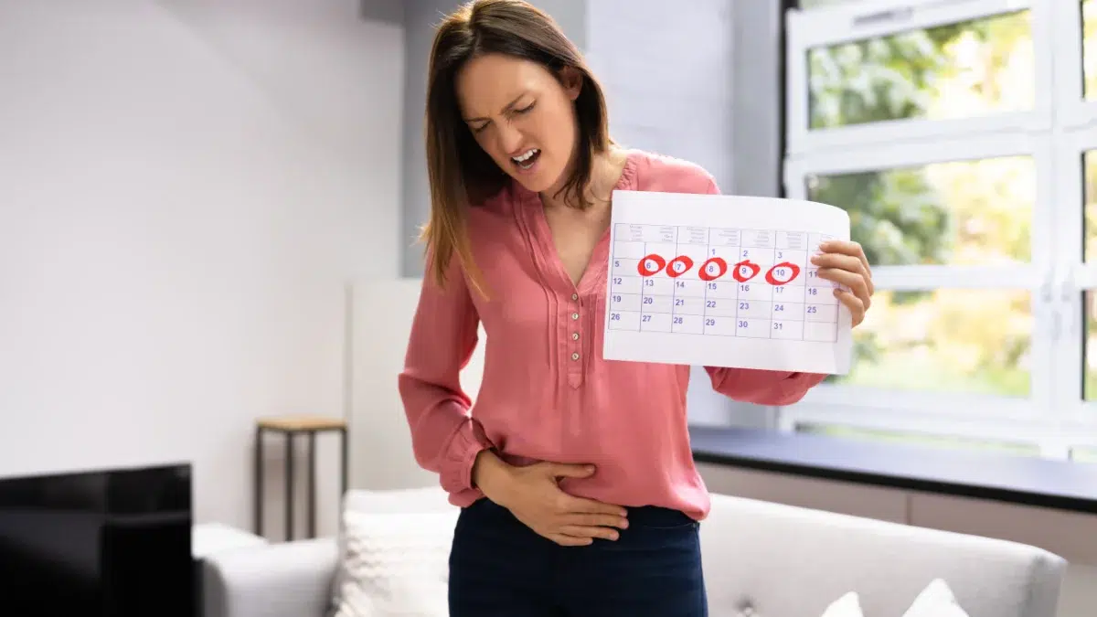 what causes a woman to menstruate twice in a month