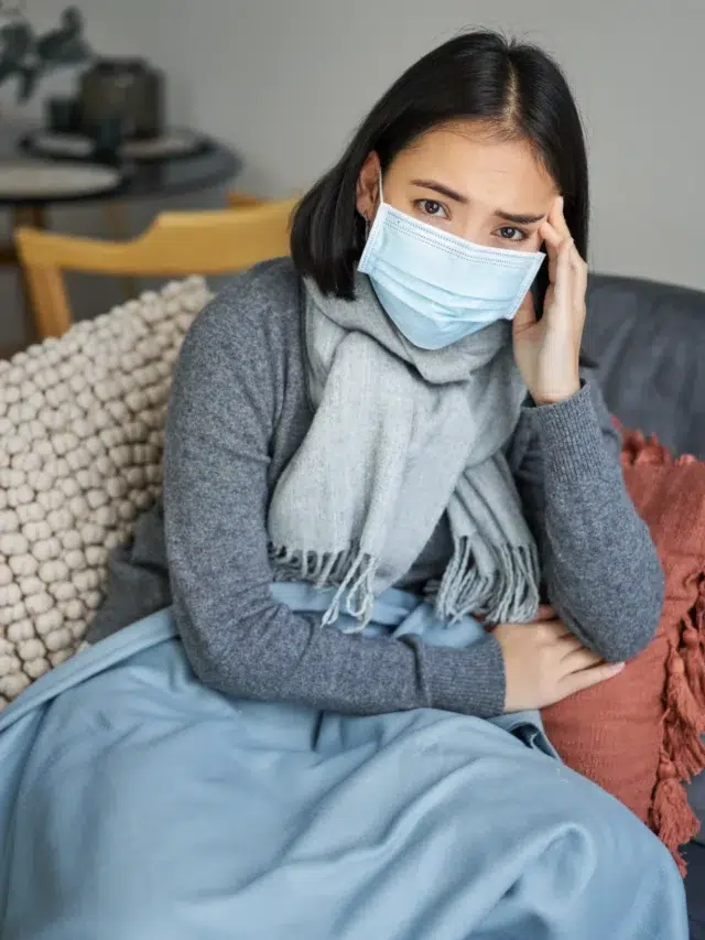 covid-health-concept-young-asian-woman-medical-face-mask-feels-sick-unwell-catching-flu-p