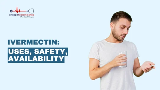 man holding a glass of water and looking at a pill in his hand