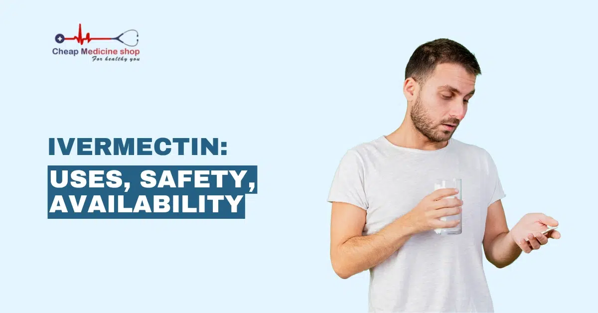 man holding a glass of water and looking at a pill in his hand