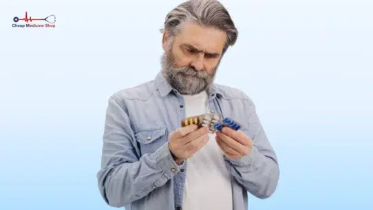 Man checking medicine strips