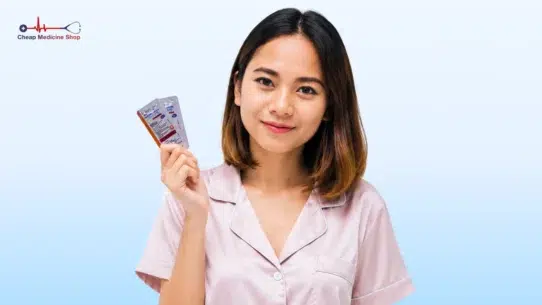 Woman holding medicine sachet