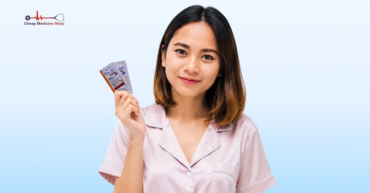 Woman holding medicine sachet